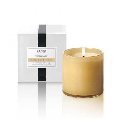 Lafco Classic Candle 6.5oz, Chamomile Lavender. Fresh sheets beckon. On the nightstand a sprig of lavender melds beautifully with warm and enveloping bergamot. Calming chamomile melts into a heart of eucalyptus to create a feeling of well-being. Smoky patchouli is enhanced by hints of sage and rosemary for a quiet, relaxing finish.