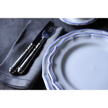 Load image into Gallery viewer, The Filet collection evokes everyday elegance with classic blue and white paired with scalloped trim. Delicate brush strokes are hand-drawn on the contours of each shell-shaped piece. 9 1/8&quot; D Dishwasher Safe
